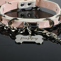 Soft Pink Snake-Texture Leather Bell Choker with Bone Tag – front view | Blackyyds