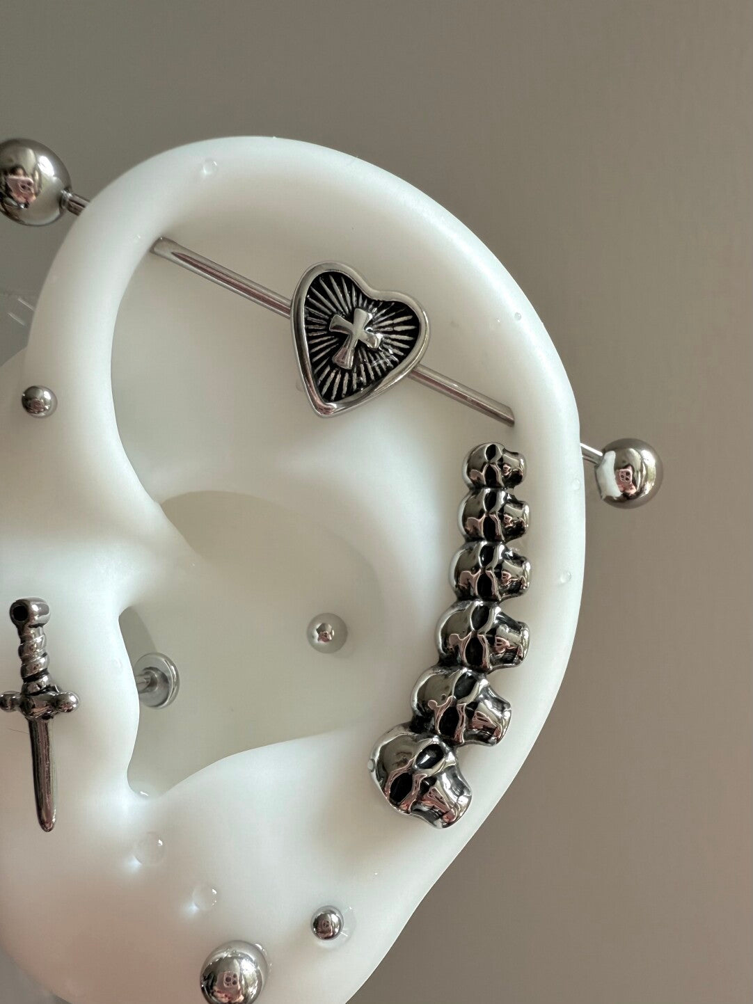 Paipai Station Skull Dagger Ear Bone Stud Titanium Steel Non-Allergic Unisex Earrings · Cross Heart Ear Bridge 1.2*38mm