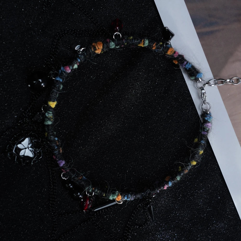 Y2K Dark Boho Heart Necklace – Handmade Yarn Statement Piece with Butterfly Pendant