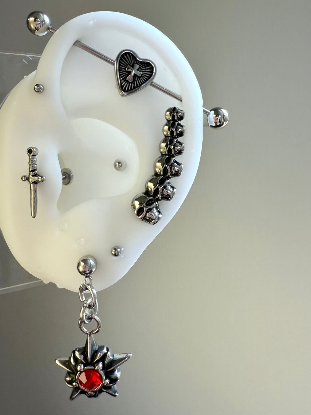 Paipai Station Skull Dagger Ear Bone Stud Titanium Steel Non-Allergic Unisex Earrings · Cross Heart Ear Bridge 1.2*38mm