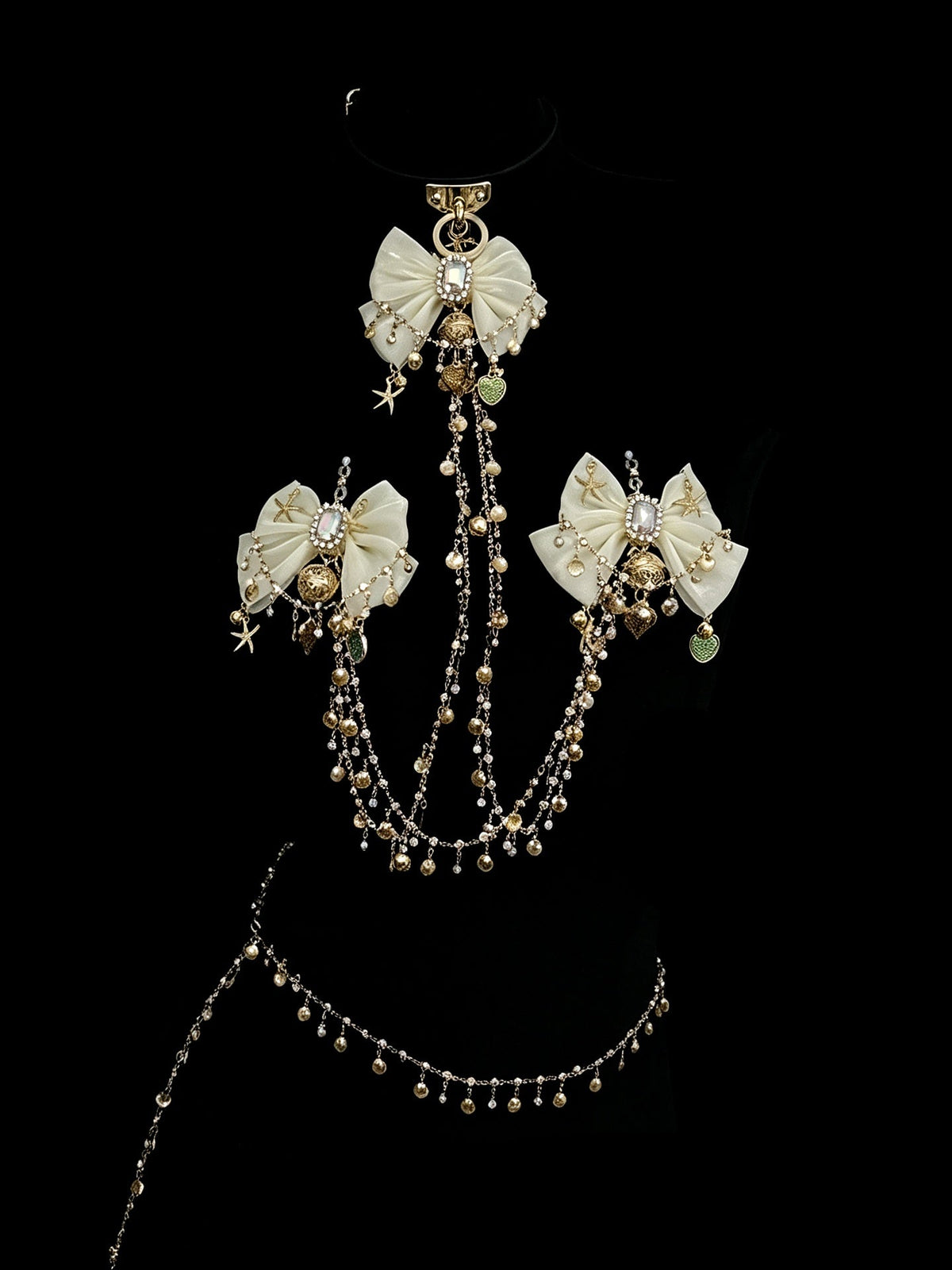 black bell bow body chain close-up of bell | Blackyyds