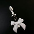 White Bow Silver Bell Jewel Plug